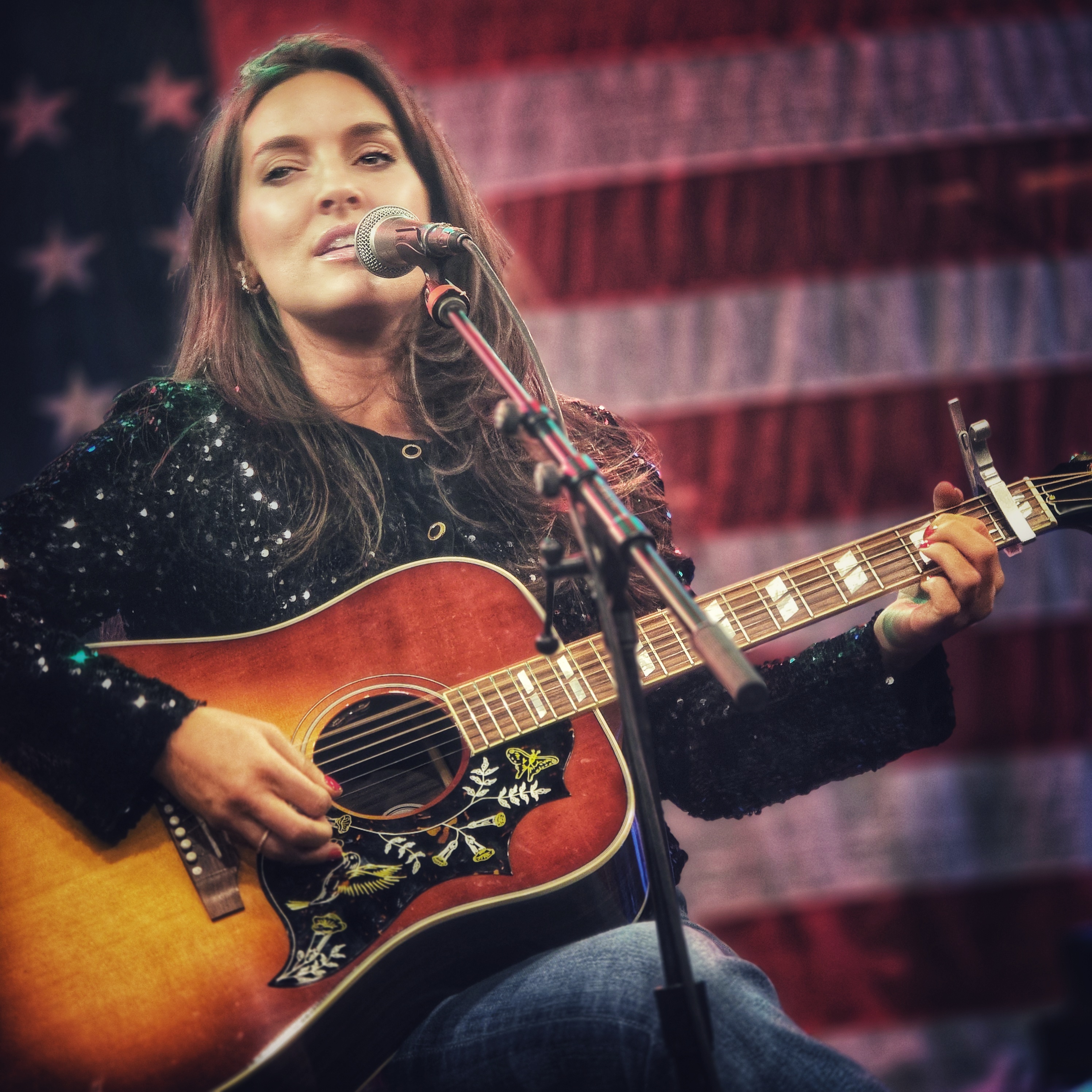 Livy Love performing at the Thursday Night Open Mic Night at Fox & Locke in Leiper's Fork, Tennessee